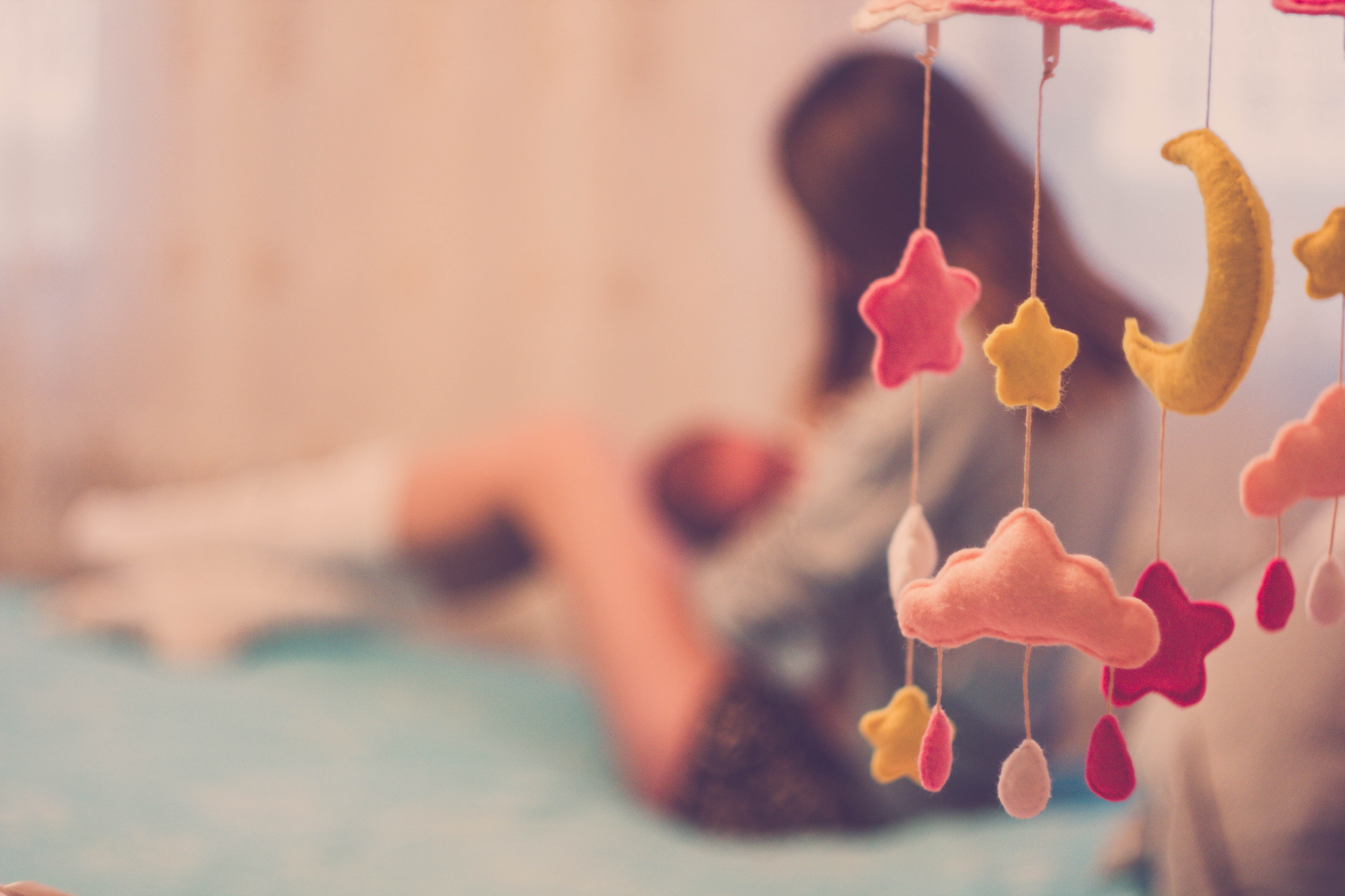 Child's nursery with woman in the background