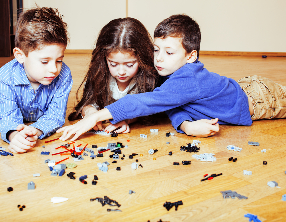 Children playing with small toys