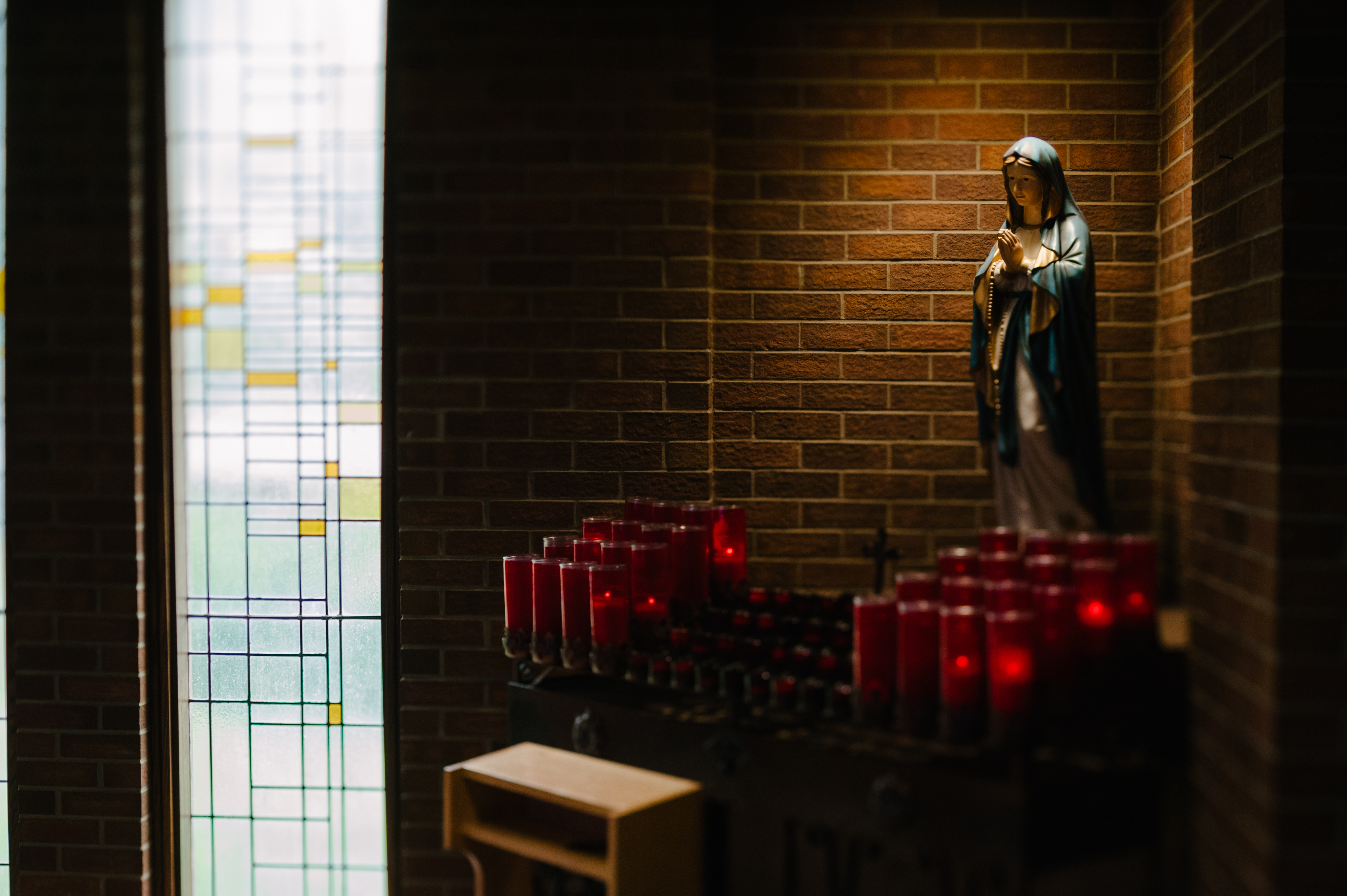 Virgin Mary candles in a church