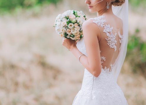 Bride in a white dress holding a bouquet