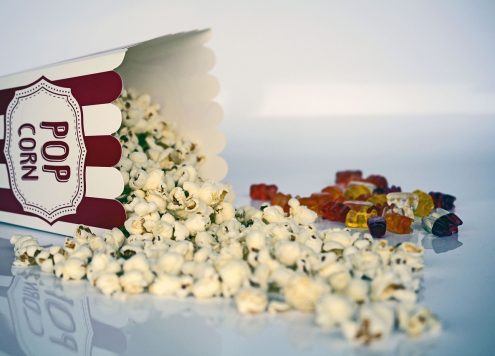 Spilled popcorn and gummy bears