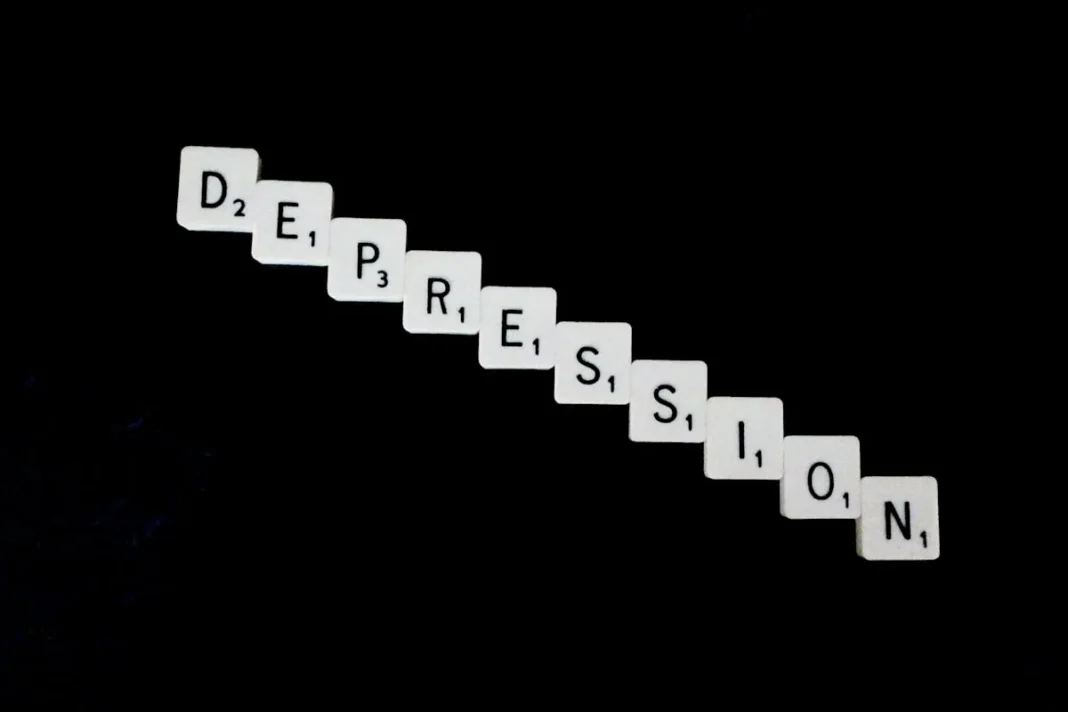 how a bipolar person loves - Depression, spelled out in white scrabble tiles.
